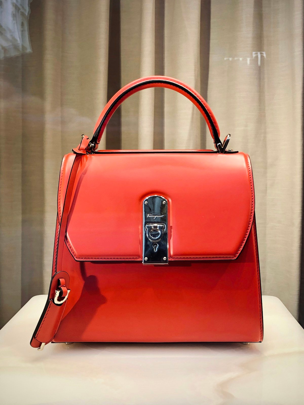 Coral leather top-handle bag